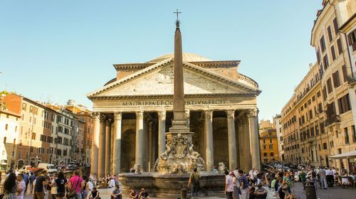 Tourists in front of historic building