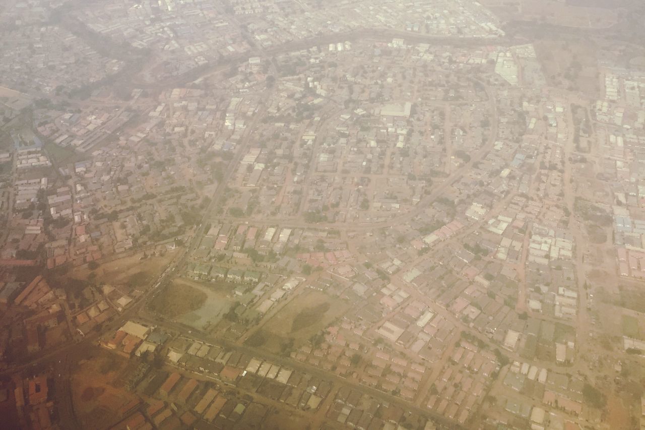 building exterior, architecture, built structure, high angle view, cityscape, aerial view, crowded, city, residential district, residential building, residential structure, day, outdoors, no people, landscape, water, house, nature, full frame, elevated view