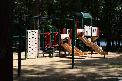 Jungle gym and trees in park