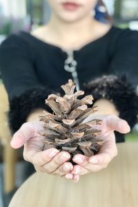 Close-up of woman holding hands