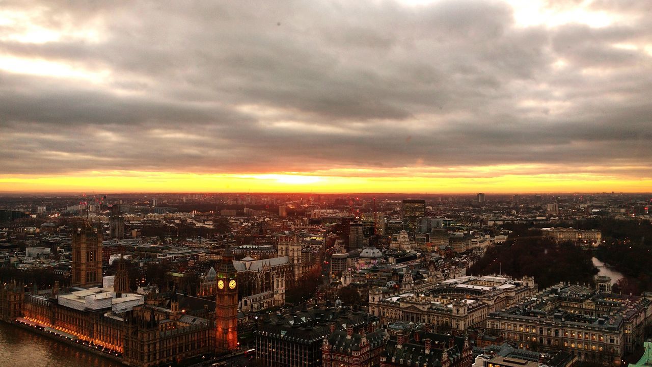 city, cityscape, architecture, building exterior, sky, skyscraper, cloud - sky, travel destinations, urban skyline, city life, outdoors, modern, built structure, no people, sunset, downtown district, nature, day