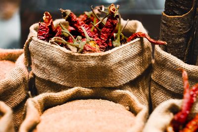 Close-up of red chili peppers in basket