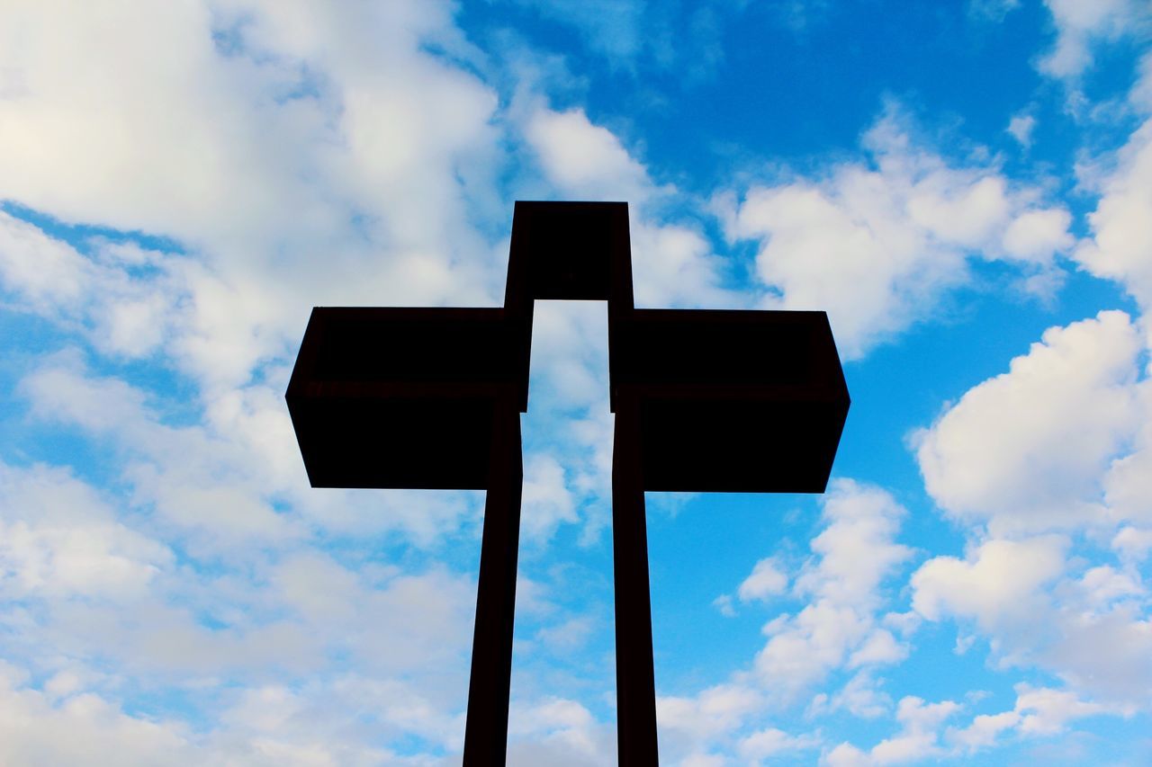 sky, low angle view, cloud - sky, cloud, cloudy, blue, no people, outdoors, silhouette, pole, day, tranquility, nature, dusk, communication, guidance, overcast, sunlight, weather, street light