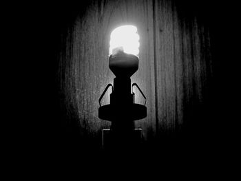 Silhouette of woman in dark background