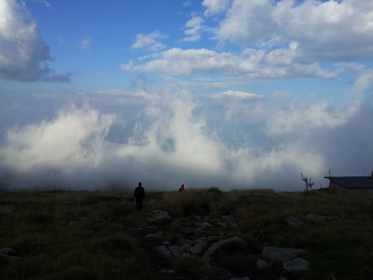 sky, landscape, men, lifestyles, leisure activity, full length, tranquility, tranquil scene, rear view, scenics, beauty in nature, nature, mountain, standing, cloud - sky, non-urban scene, hiking, person