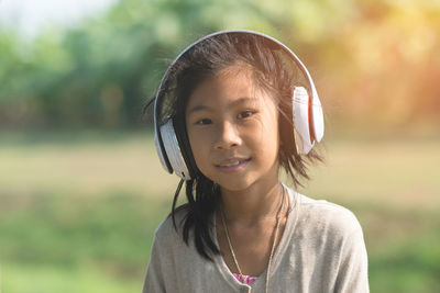 Portrait of girl wearing ear protector