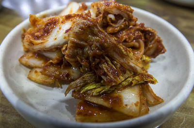 Close-up of kimchee served in plate on table
