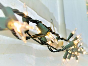 Close-up of light bulb hanging