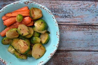 Close-up of fruits in plate on table