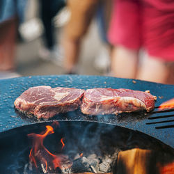 Close-up of meat on barbecue grill