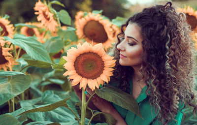 Close-up of woman with flowers