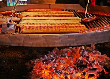 High angle view of meat on barbecue grill