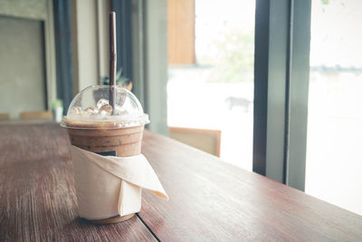 Iced coffee on table