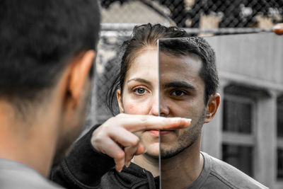 Close-up of young man smoking