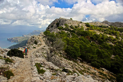 Scenic view of mountains and sea against sky