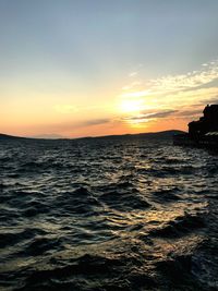 Scenic view of sea against sky during sunset