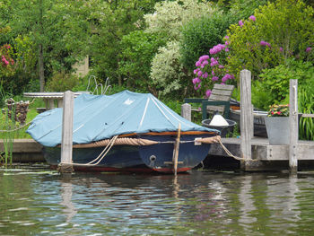 Boat moored in lake