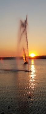 Scenic view of sea at sunset