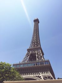 Low angle view of eiffel tower against clear sky during sunny day
