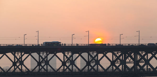 View of bridge at sunset