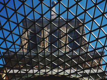 Low angle view of glass ceiling in building