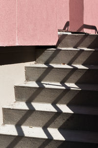 High angle view of shadow on wall of building