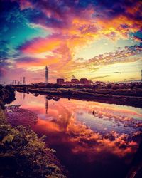 Scenic view of silhouette bridge against sky during sunset