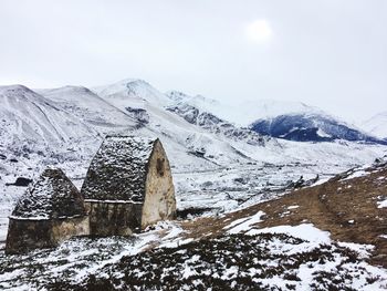 Snow covered mountain against sky