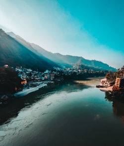 Scenic view of river ganga against the morning mist and hills of beautiful city of rishikesh, india 