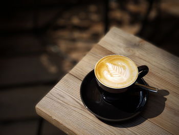 Close-up of cappuccino on table