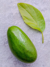 Close-up of avocado and leaf