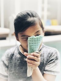 Portrait of girl holding ice cream cone