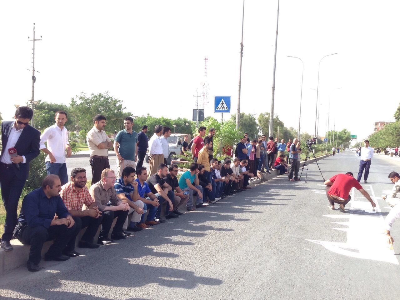 large group of people, street, clear sky, walking, person, casual clothing, in a row, day, outdoors, the way forward