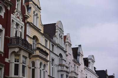 Low angle view of residential buildings against sky