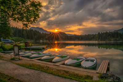 Scenic view of lake against sky during sunset