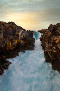 Scenic view of sea against sky during sunset