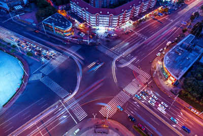 High angle view of illuminated city street at night