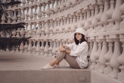 Portrait of young woman standing in temple