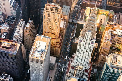 High angle view of chrysler building amidst towers in city