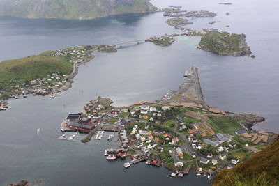 View from the top of the mountain to the valley and water - reinebringen lofoten