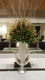 Close-up of flowers in vase on table