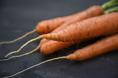 Close-up of carrots on table