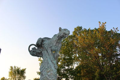 Low angle view of statue against clear sky