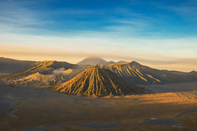 Panoramic view of volcanic landscape against sky