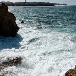 Scenic view of sea against clear sky