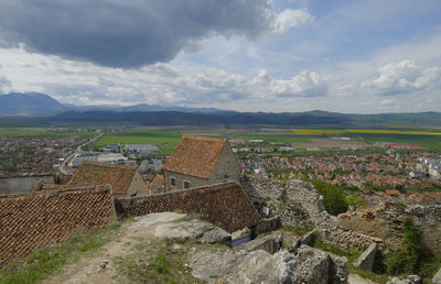 High angle view of residential district against sky