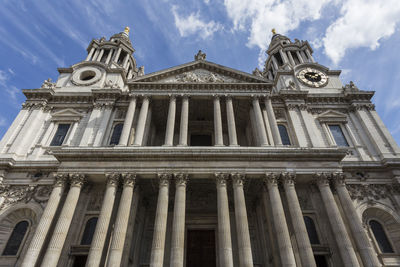 Low angle view of cathedral against cloudy sky