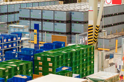 Industrial distribution, composition. storage with high shelves, cargo boxes on racks. 