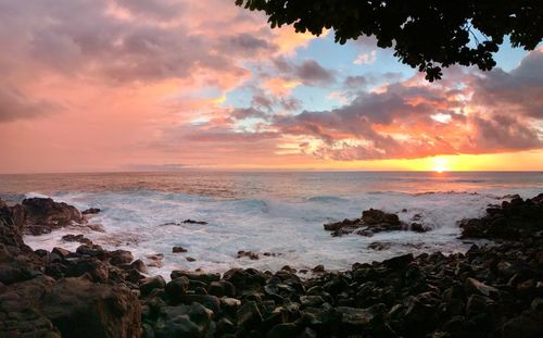 Scenic view of sea against sky during sunset