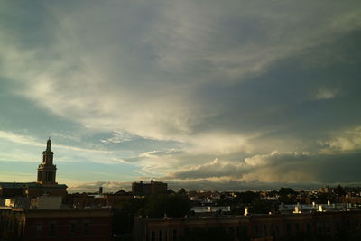 Cityscape against sky during sunset